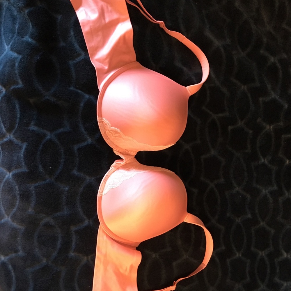 Pink and white lace bra